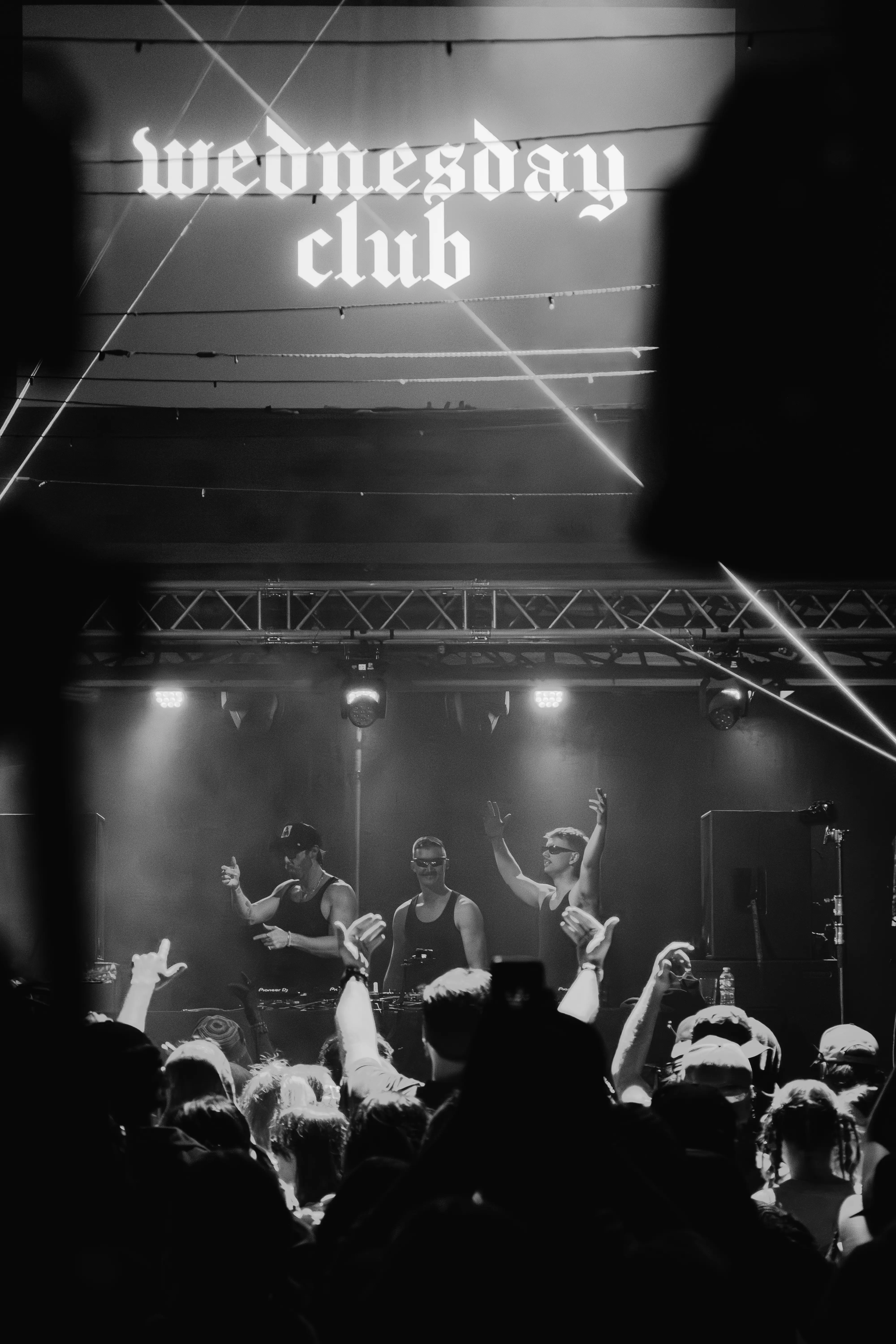 Wednesday Club performing on a large stage